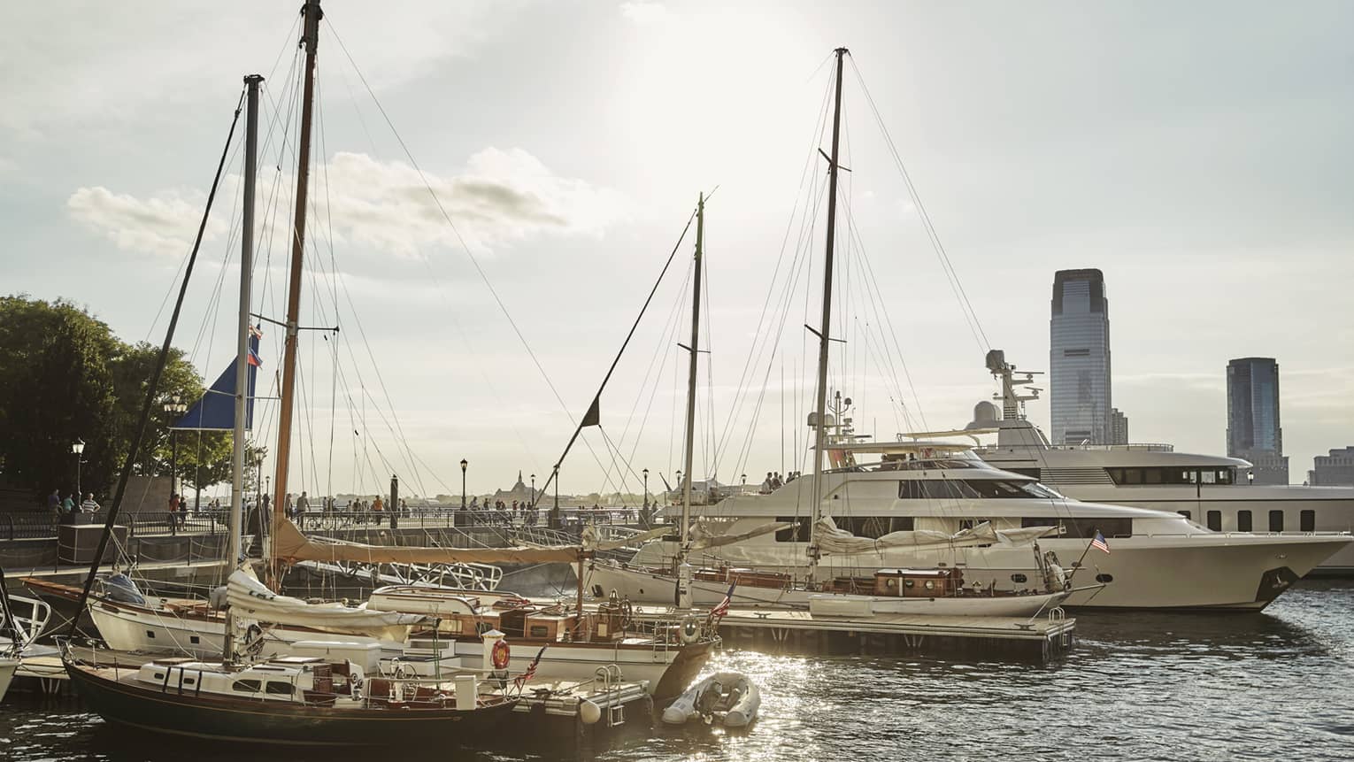 Boats, yachts parked in sunny New York City harbour