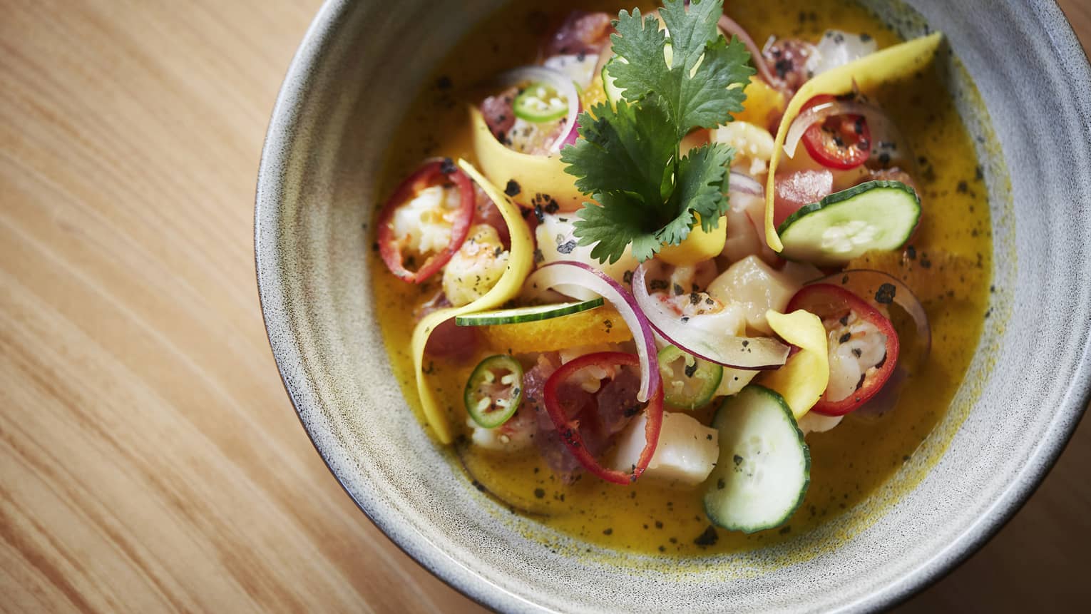 Aerial view of fresh ceviche summer dish with shaved vegetables
