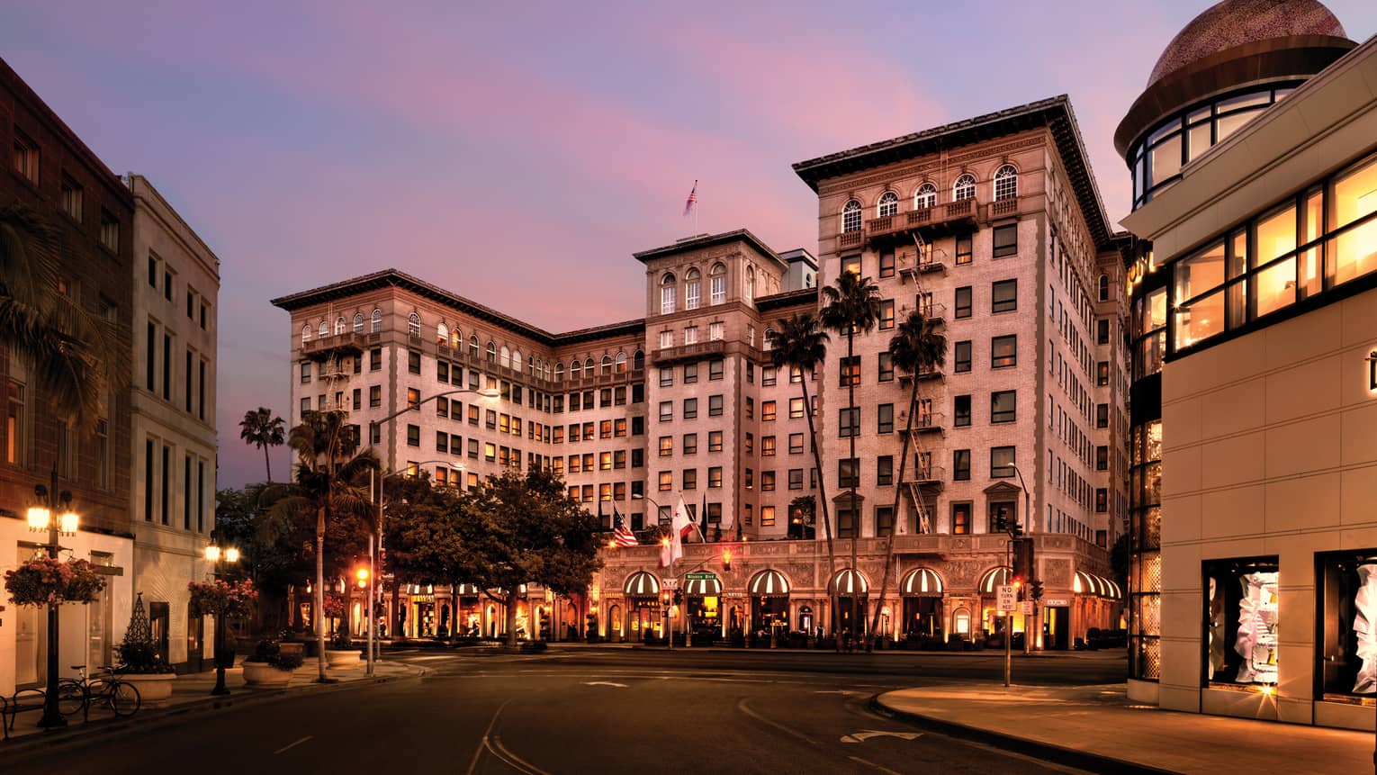 Hotel exterior, entrance at sunset