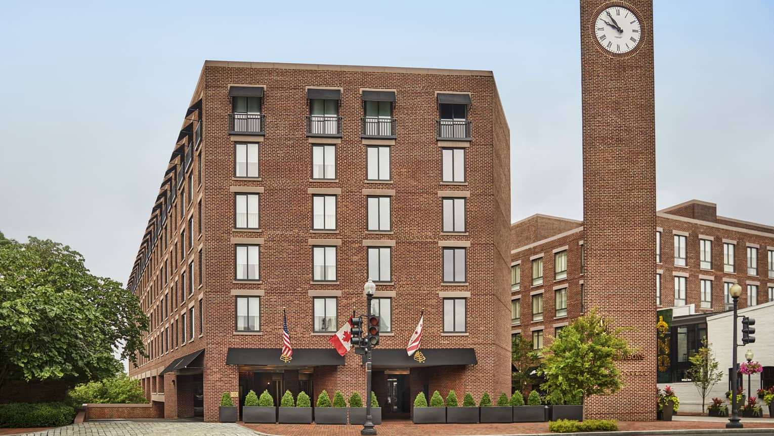 Four Seasons Hotel Washington exterior brown brick building with clock tower